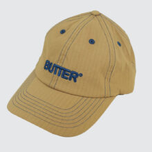 Butter Goods Nylon Rounded Logo 6 Panel Cap Sand Butter Goods Nylon Rounded Logo 6 Panel Cap Sand